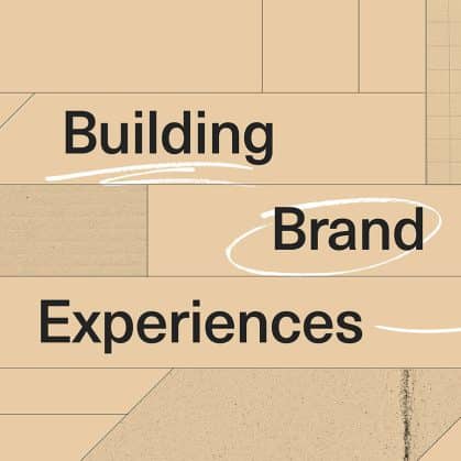 Bold typography reading "Building Brand Experiences" on beige background with white brushstroke accents and concrete texture for Foster project